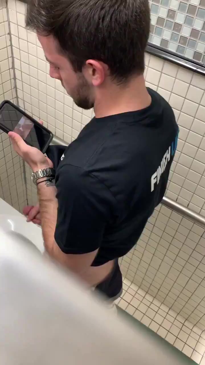 Man caught wanking in bathroom stall