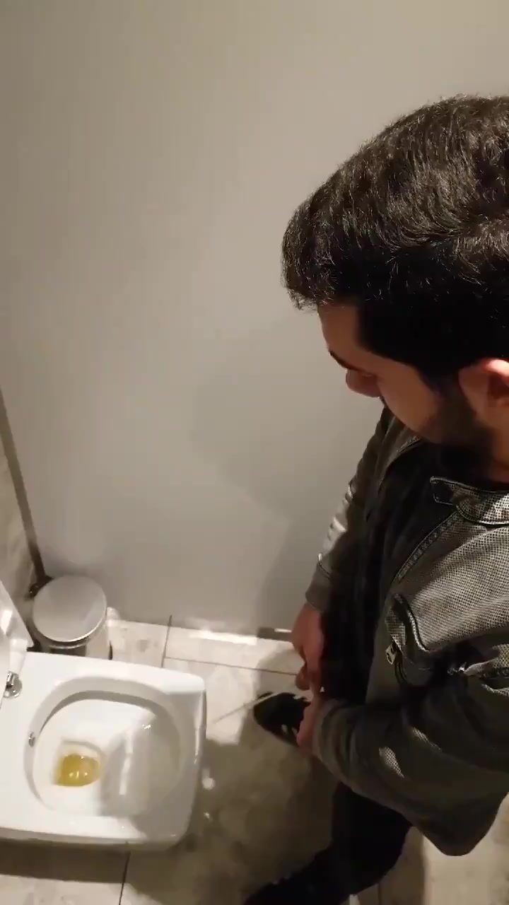 SPYING MEN IN THE TOILET image