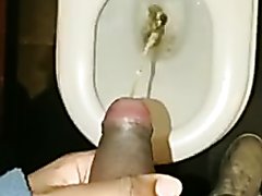 YOUNG BLACK BOY SHOWING AND PISSING