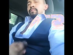 Suited jerking off in the car