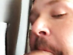 Two straight mates take turns at the glory hole