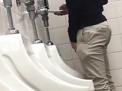 hot boy peeing at the urinal 33