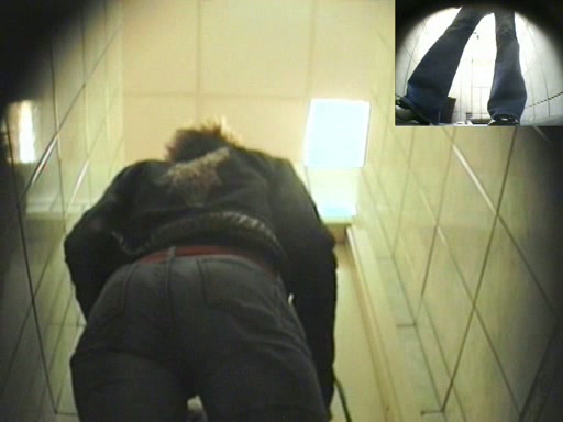 Young lady filmed pissing in WC