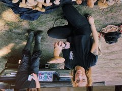 Young woman farting bare assed in public
