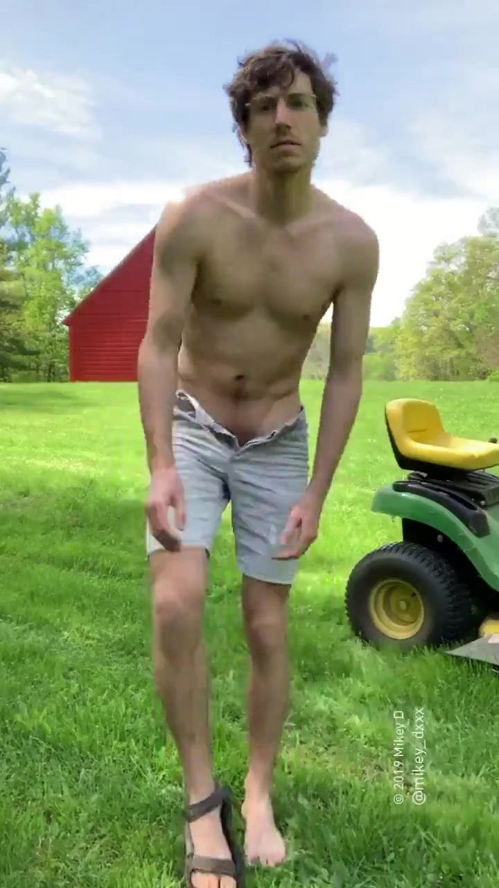 Lovely hansome guy going naked in a farm