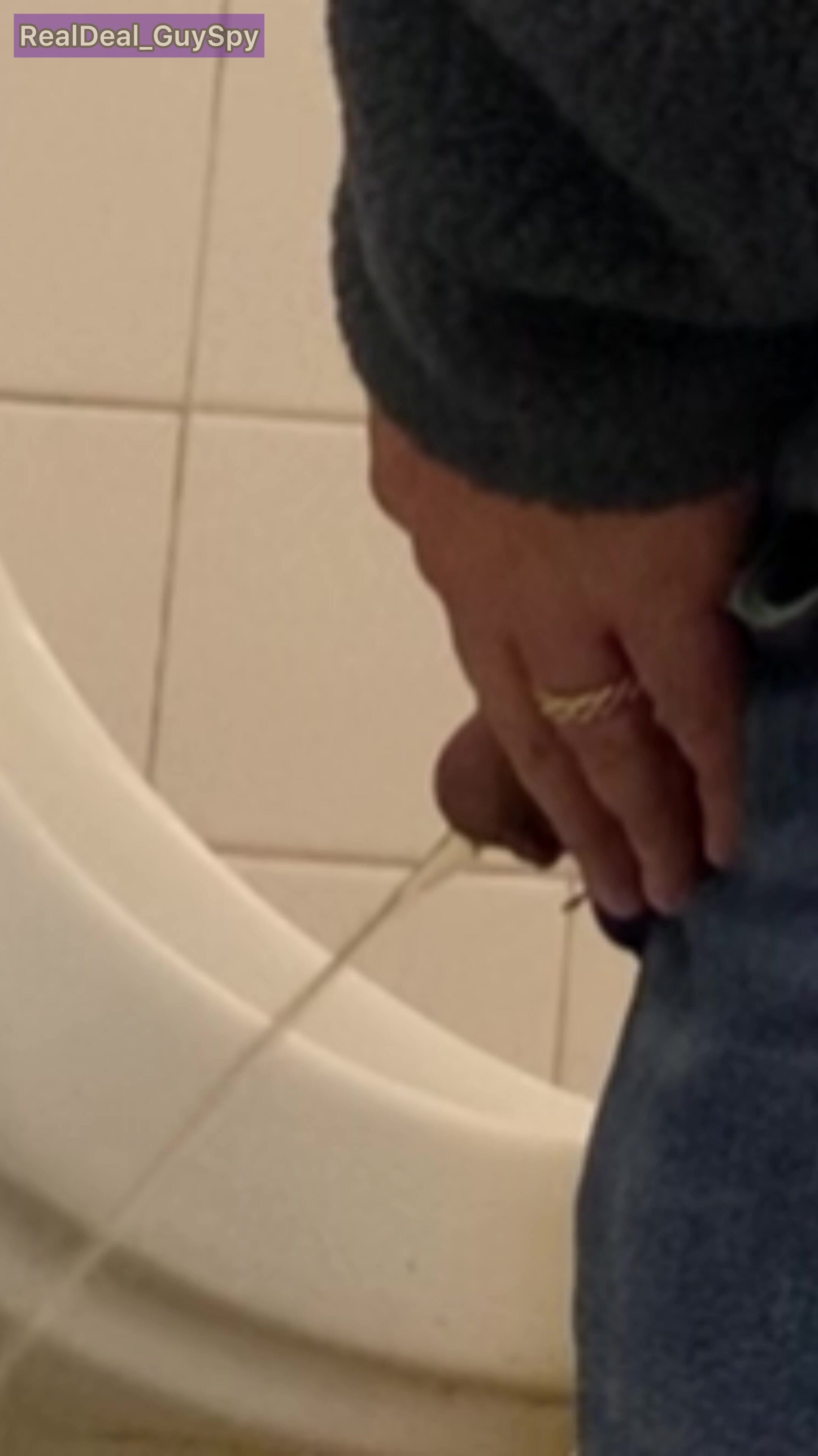 Spy on little dick dude at the urinals pissing - ThisVid.com