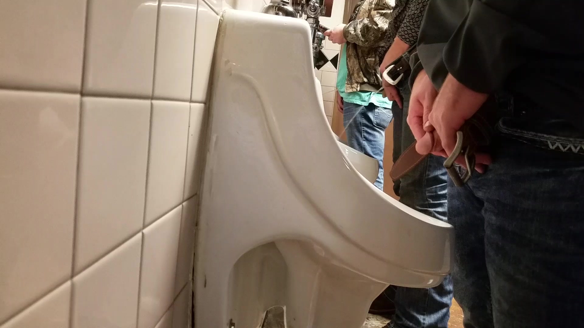 voyeur hidden camera of men peeing