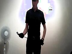 Young Leather dom smokes cigar