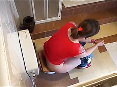 woman pooping in toilet - video 36