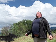 BIG GUYS STROKING AND PISSING OUTSIDE