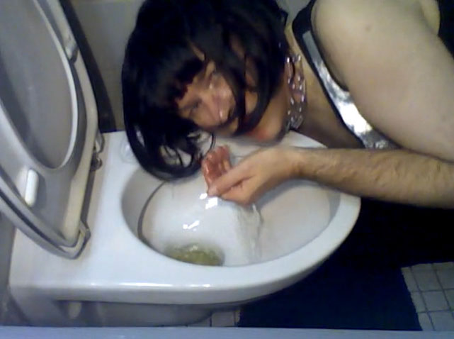 Perverted crossdresser drinks his urine from the toilet