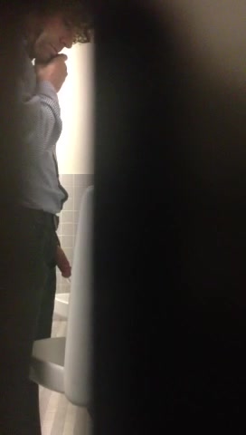 Guy at urinal