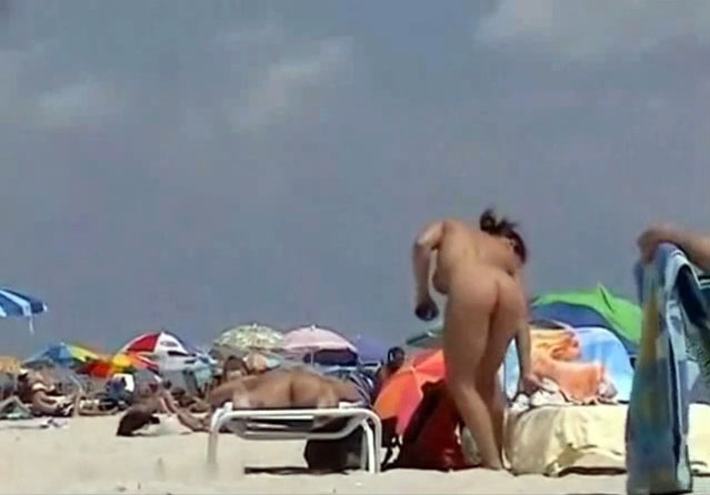 Sweet babes are lying naked on a beach