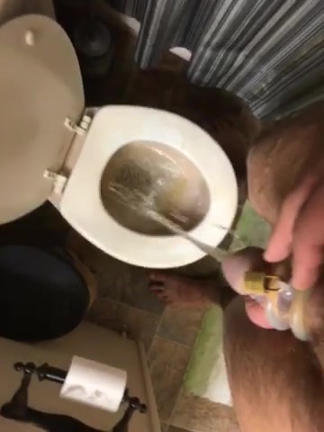 Slave cleans toilet