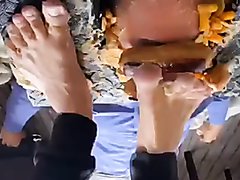 Master crushes food on his slaves face