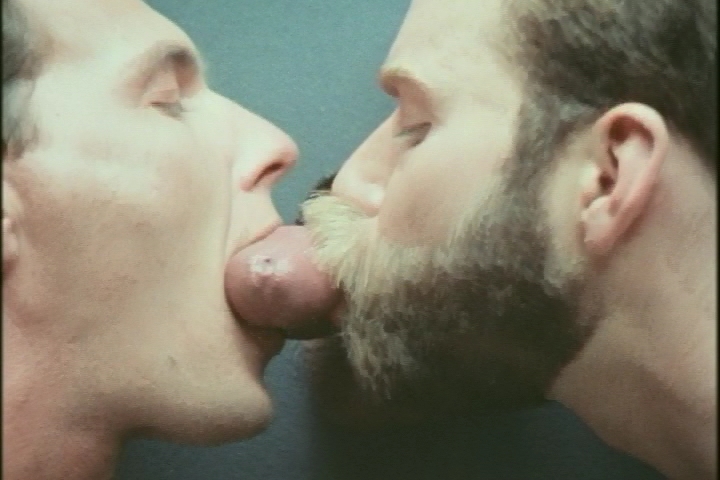 Two guys sucking cock in a glory hole image photo