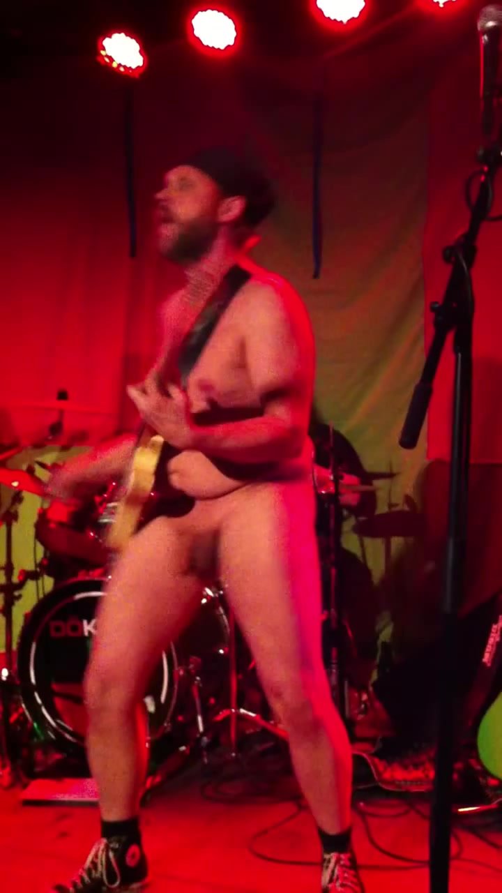 Guitar player naked on stage