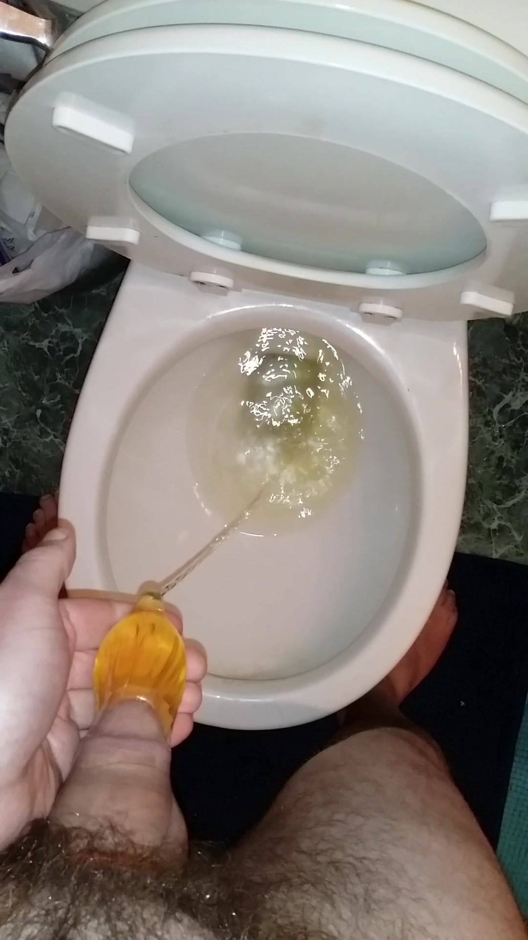 Emptying A Piss Filled Condom