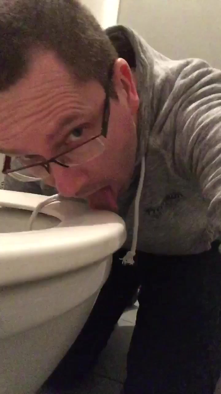 Faggot licks toilet