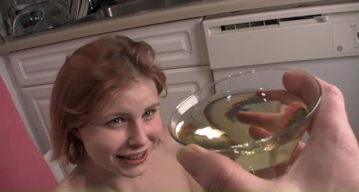 Cute young redhead has to drink it all up - again and again