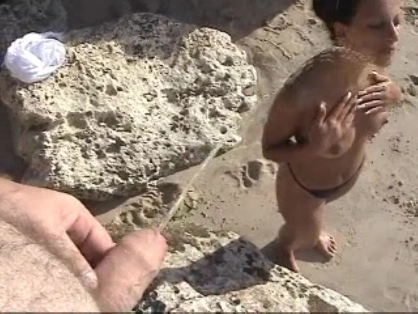 Amateur wife agrees to beach golden shower image
