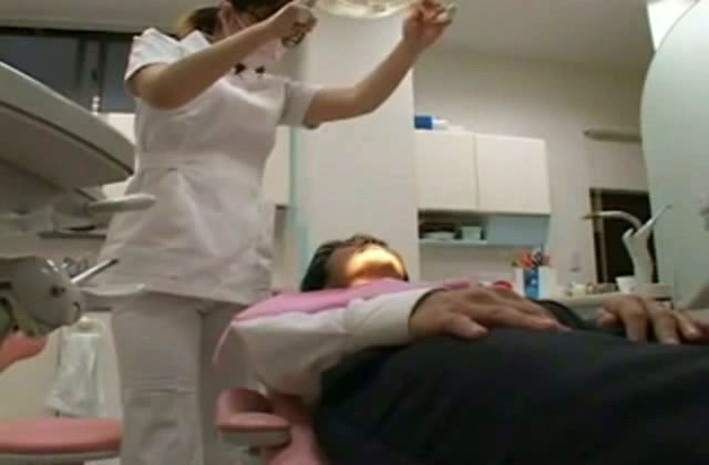 Lustful female dentist wanks her patients boner