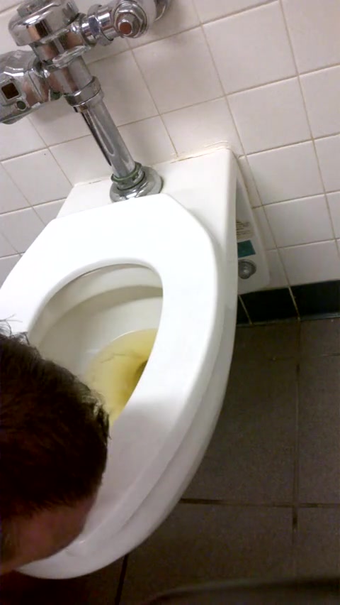 Faggot cleans piss filled toilet