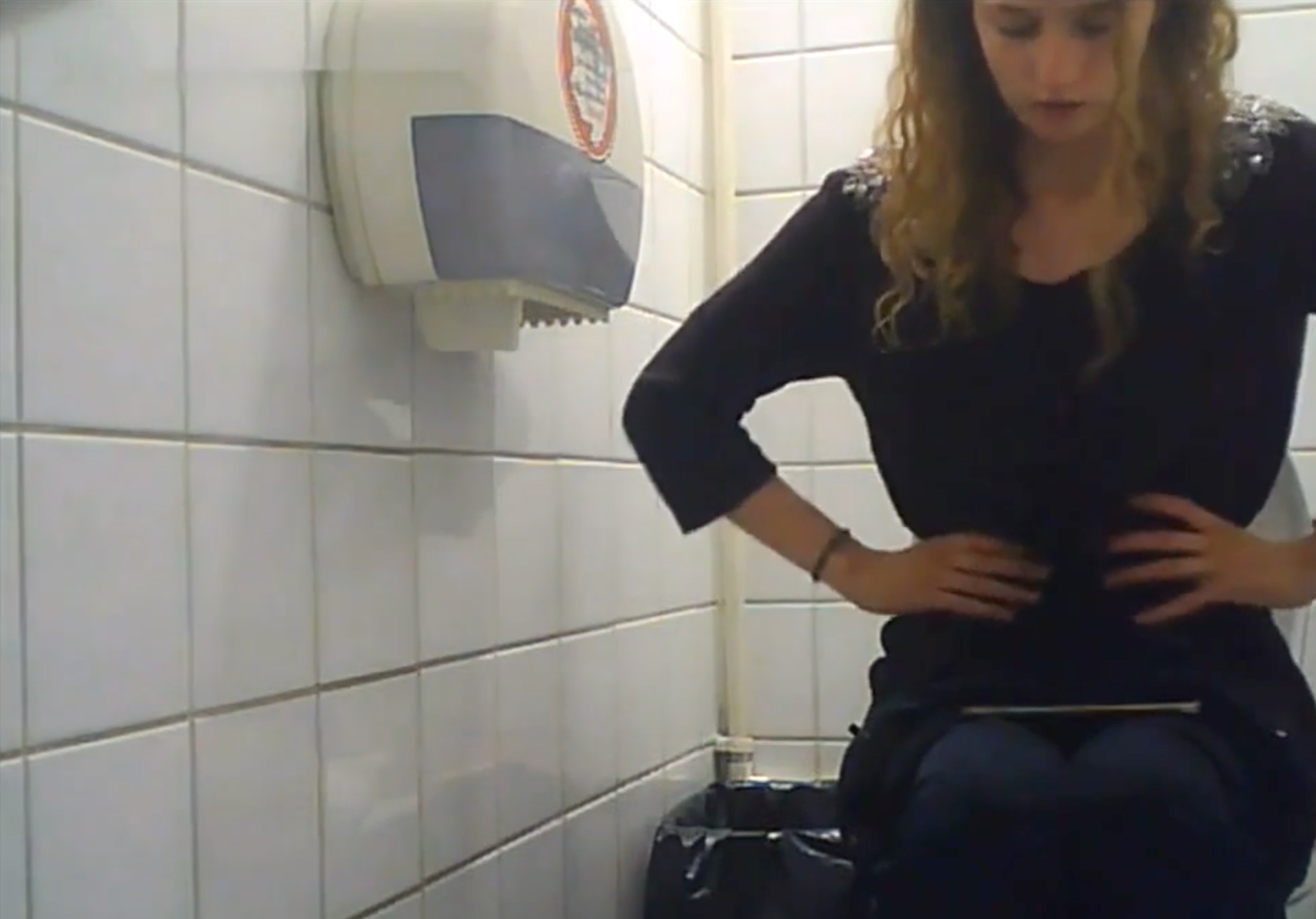 Young girl pooping publicly