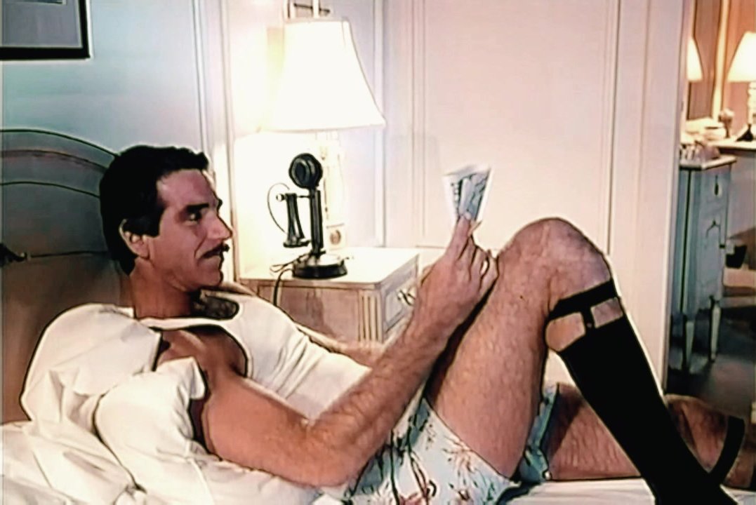 Retro Stud Harry Reems relaxes in his underwear & sock garters - ThisVid.com