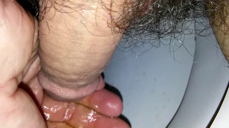 Pissing into hand