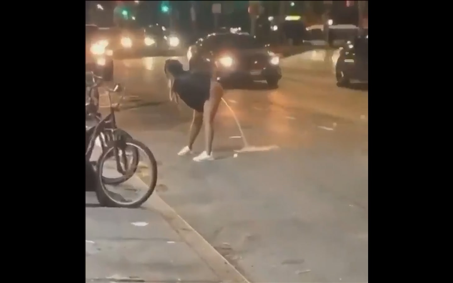 Ebony Pissing in the Middle of the Street