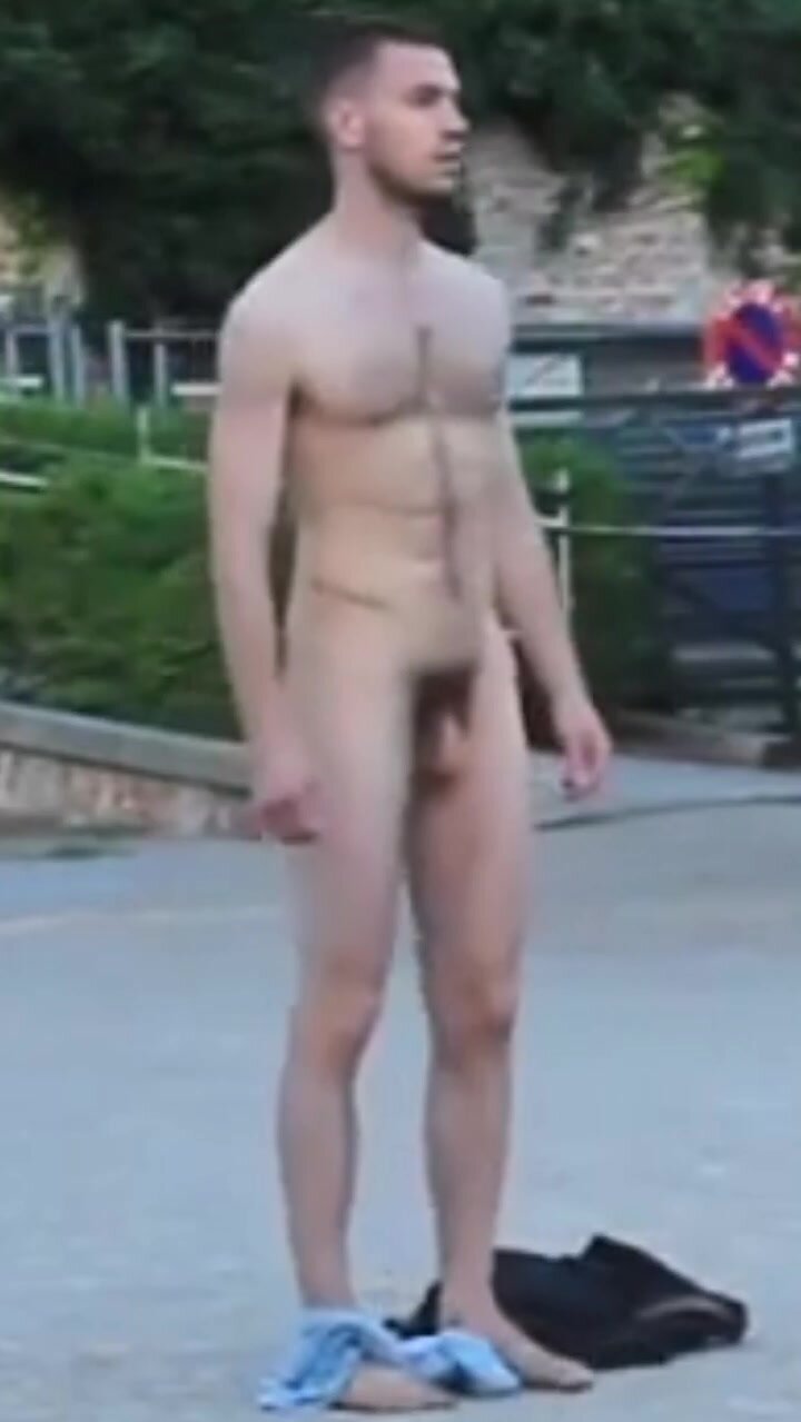 Naked group of men in public performance