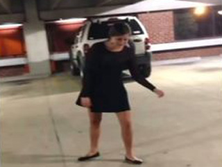 Drunk girl vomits in a parking garage