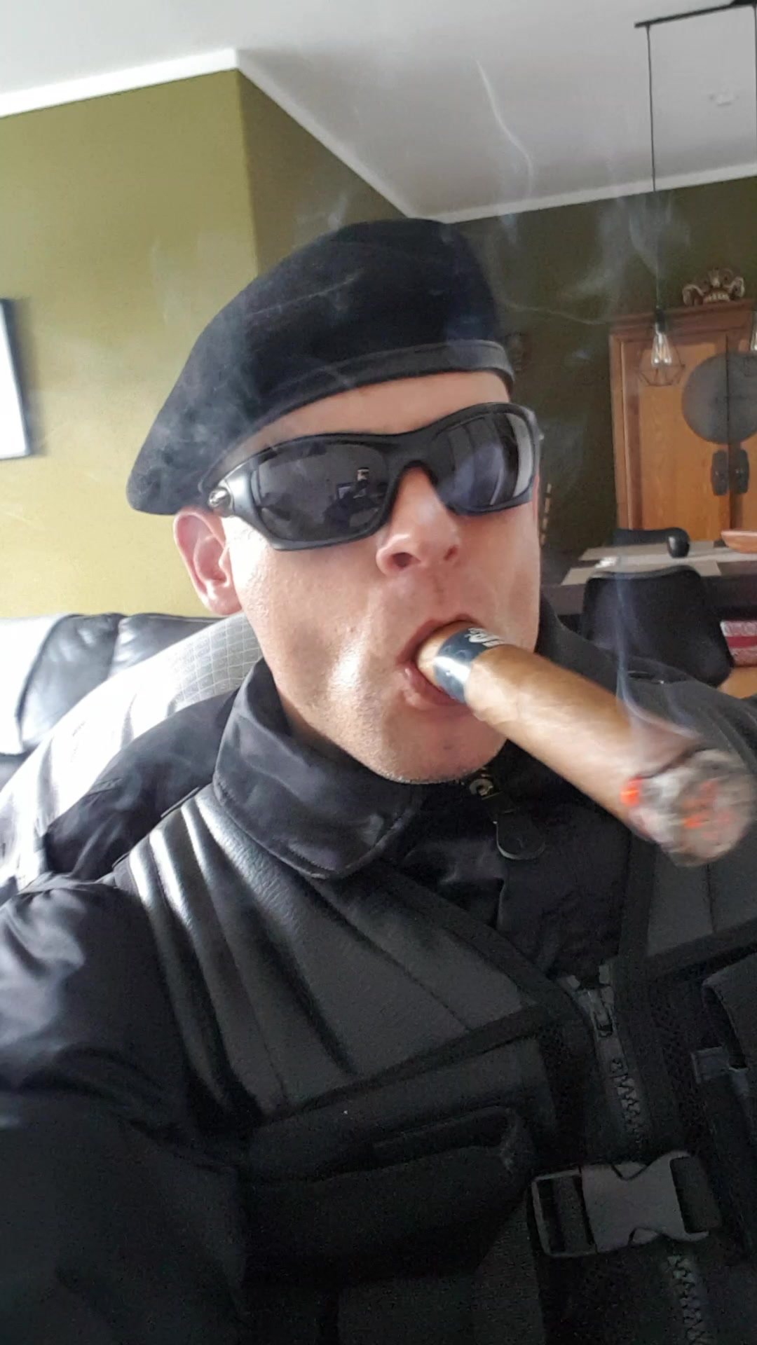 Security Guard smoking a Cigar in Uniform pic
