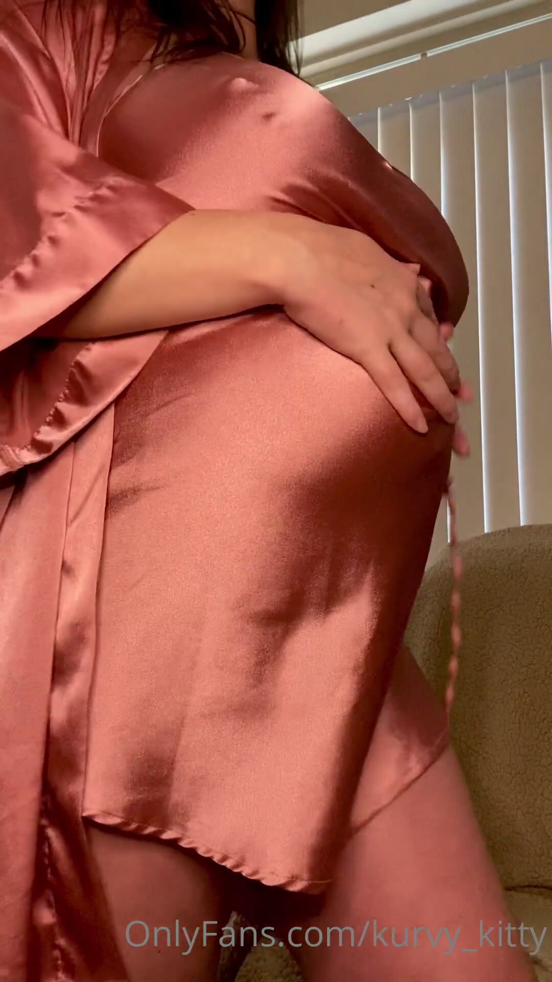 Huge pregnant red dress image