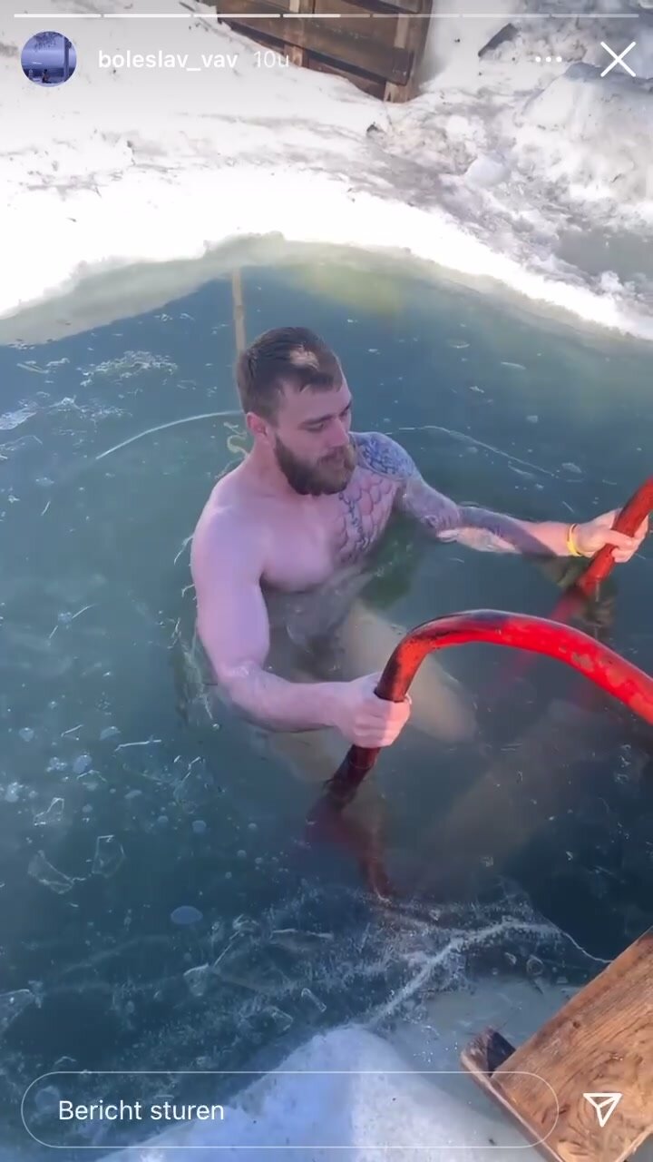 Russian takes a naked ice dive - ThisVid.com