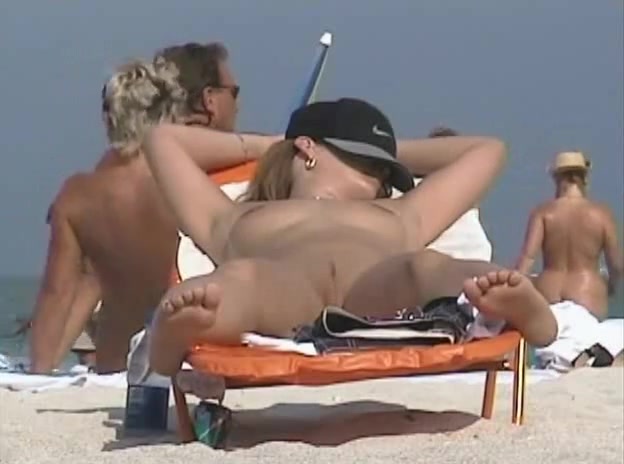 Lots of shaved pussies on the beach