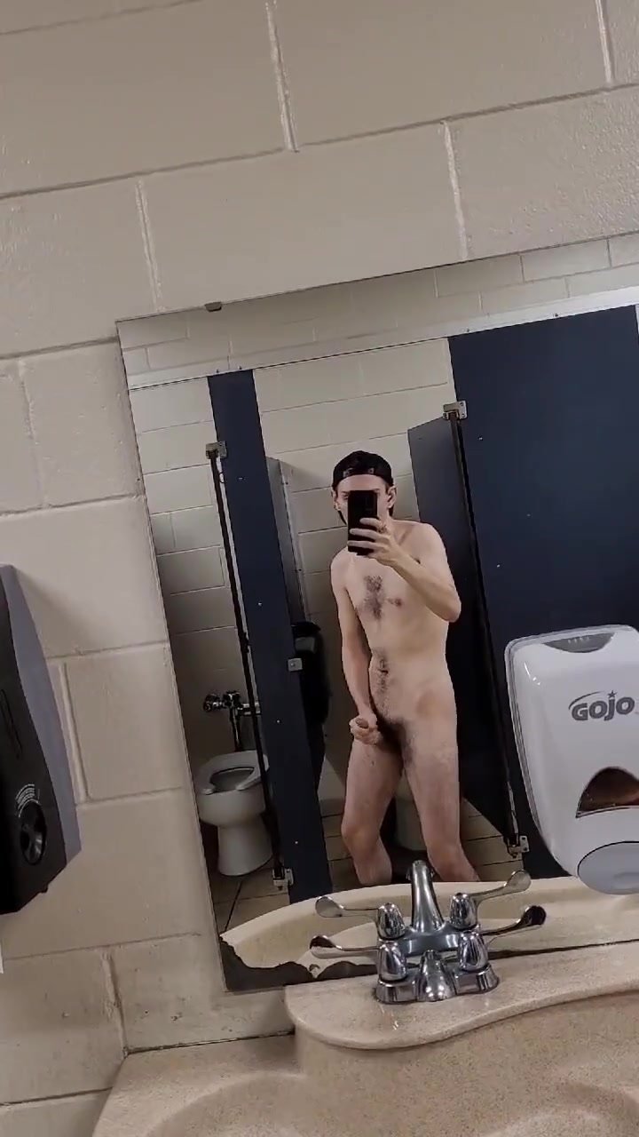 Guy JO naked in a public restroom picture