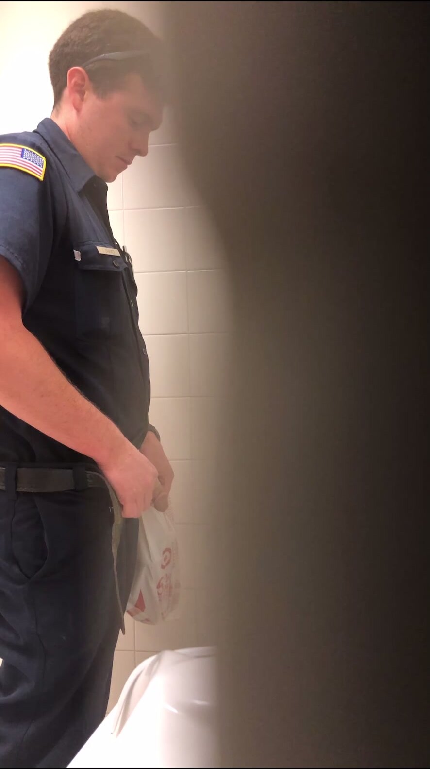 Police Officer Taking a piss at Target! picture