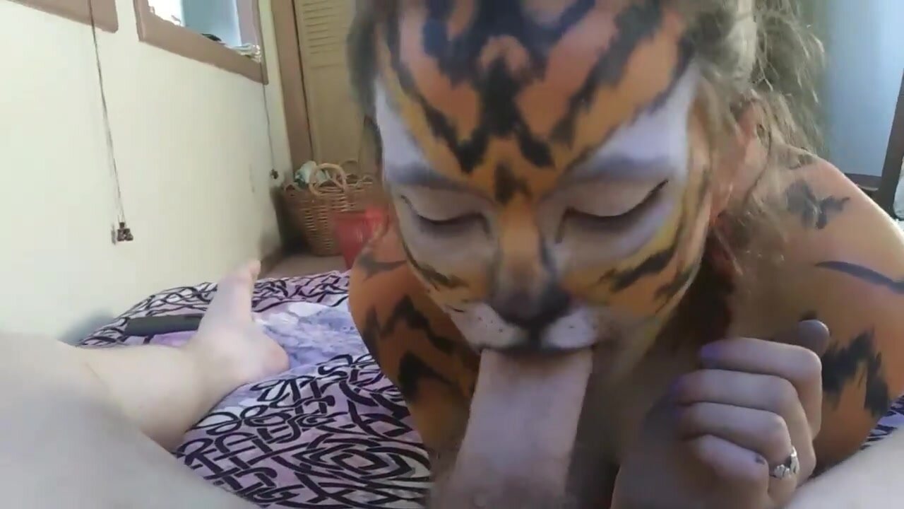 Cum on her face tiger bodypaint