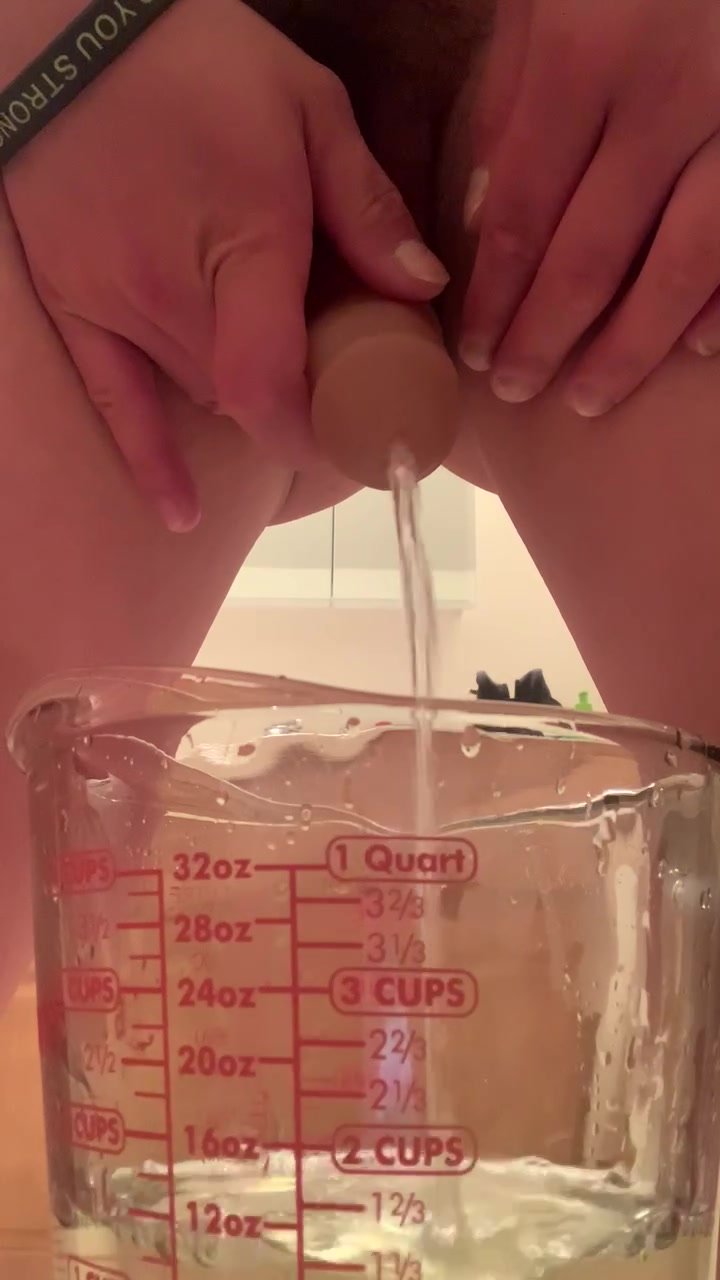 Long desperate piss into measuring cup! picture pic