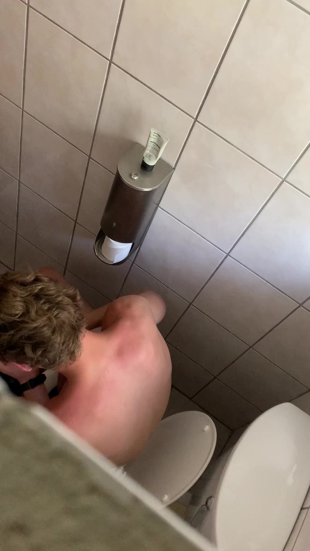 Blond SA boy jerks in camp toilet photo