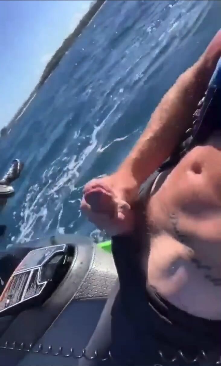 Guy Wanks Off Until He Cums While On JetSki!! photo