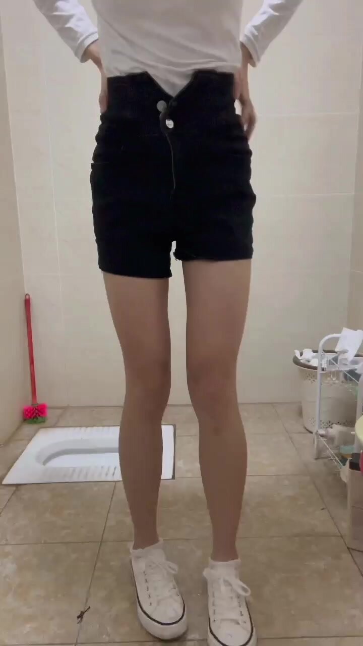 Chinese girl wetting her pants photo photo