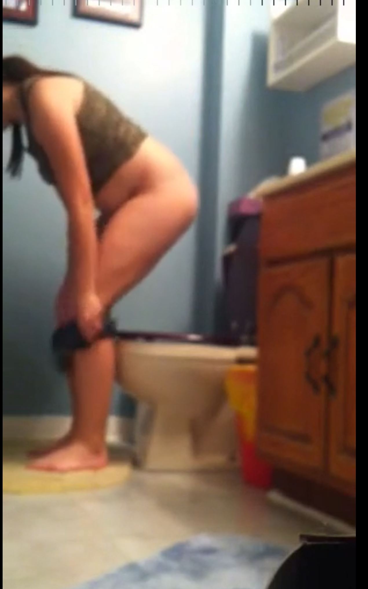 Cute Teen Girl Peeing On The Toilet. image