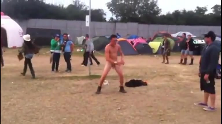 Naked guy having fun at the festival