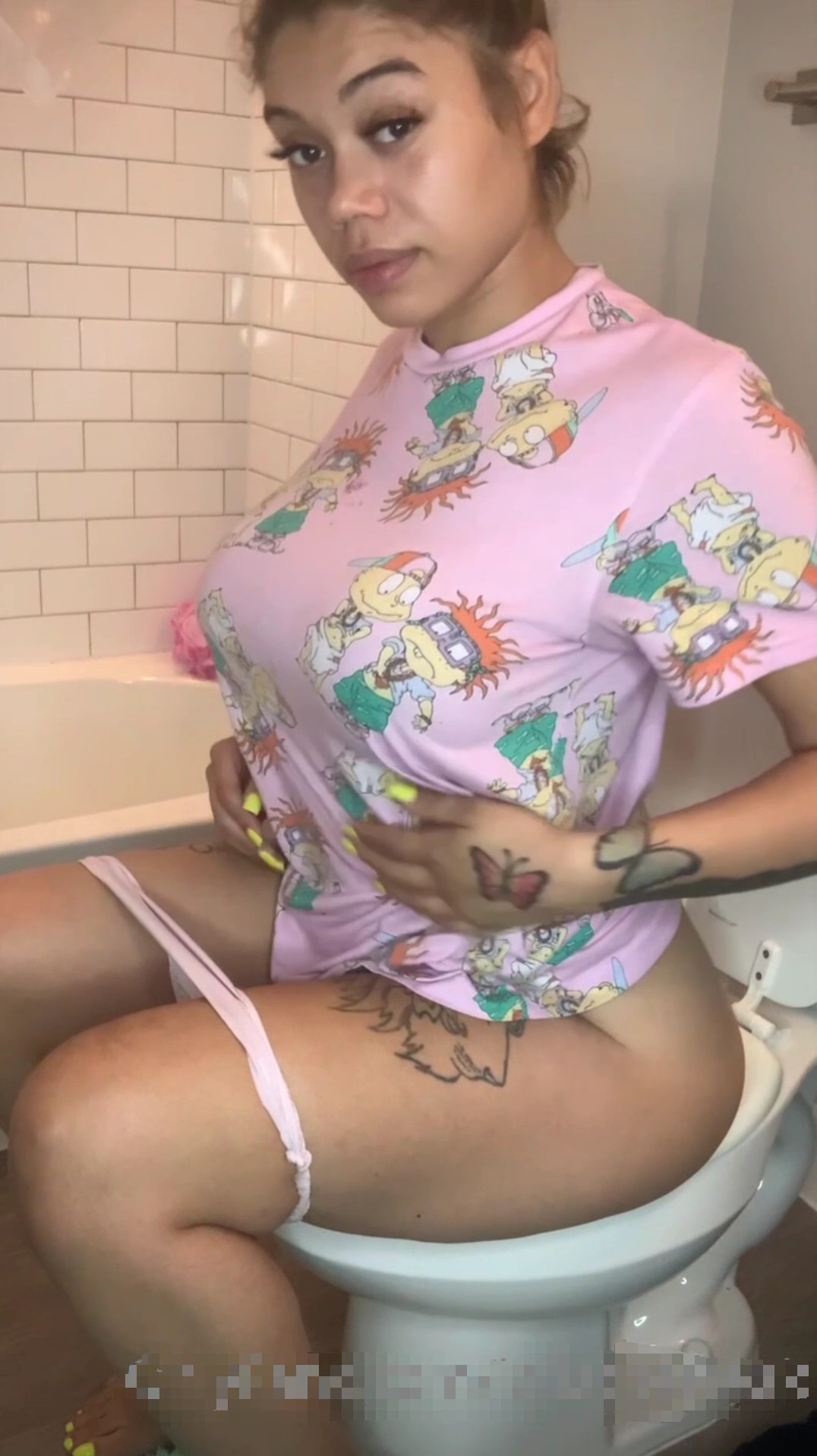 Tattooed Latina Shitting On Toilet (No Scat Visible) picture