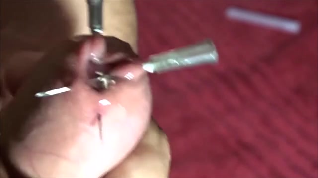 Pierced dick cums because of the pain