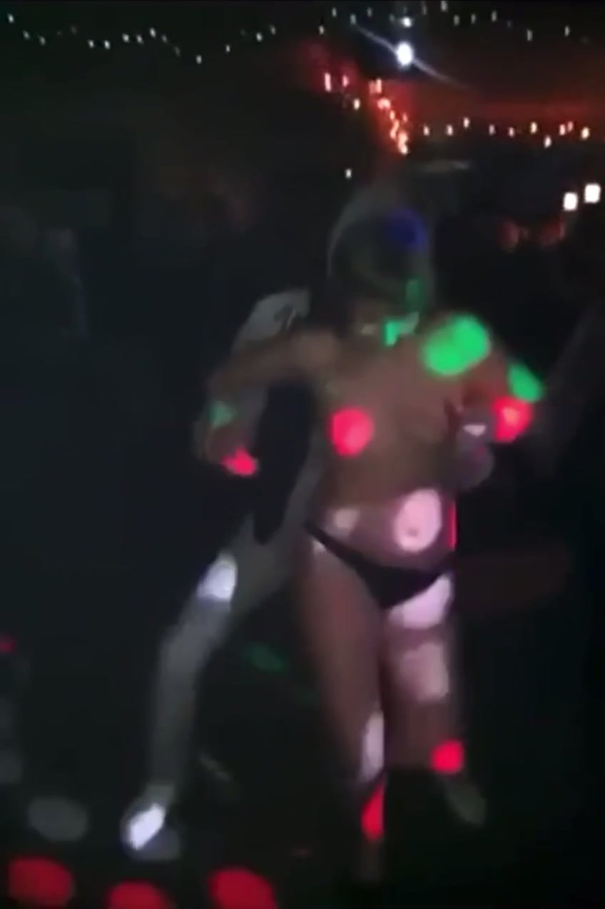 Girl stripping in nightclub picture image