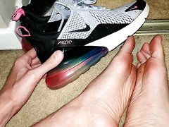 Showing Size Labels in his Shoes